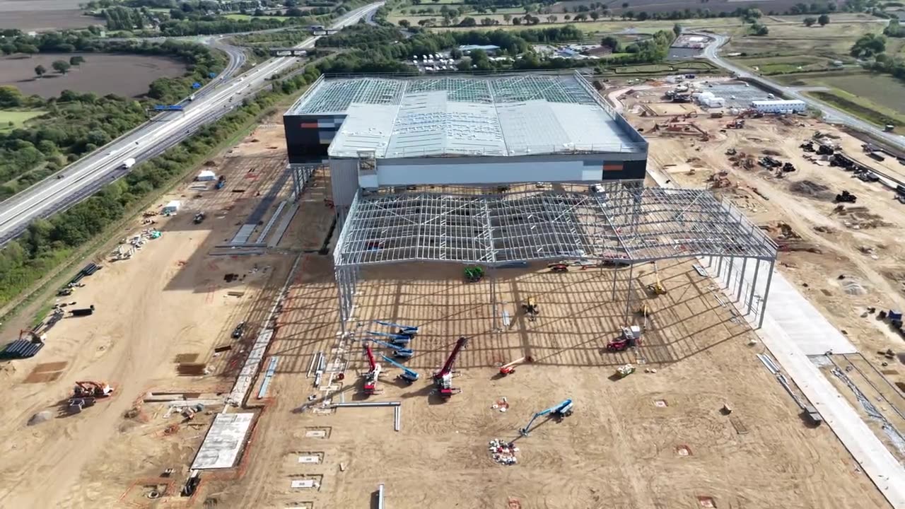 Warehouse steel frame going up on a cleared site